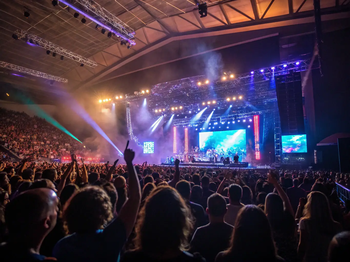 A dynamic image showcasing a live concert performance at the AMICALE LAIQUE SAINT CERNIN venue, with musicians on stage and an enthusiastic audience, highlighting the excitement of live cultural events.